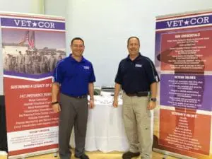 CEO and COO at trade show scaled