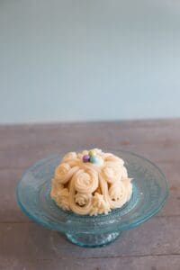 Scroll Pattern Bundtie On Blue Pedestal