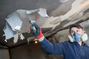 Fire,Damage,And,Restoration,Indoor,Interior.,Removing,Damaged,Paint,Layer