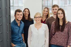 Group portrait of co workers in office