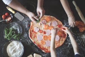 Child,And,An,Adult,Prepare,Pizza,For,Dinner,,Hands,Add