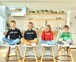 4 kids in sweaters