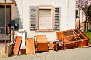 Old,Wooden,Furnitures,And,Bulky,Waste,In,Front,Of,A