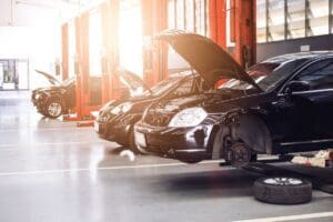 Black,Car,Repair,Station,With,Soft focus,In,The,Background,And