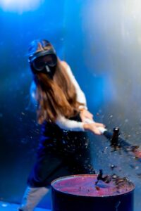 A,Girl,In,A,Protective,Mask,Smashes,A,Glass,Bottle