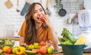 Portrait,Of,Beauty,Health,Asian,Woman,Having,Fun,Hold,Tomato